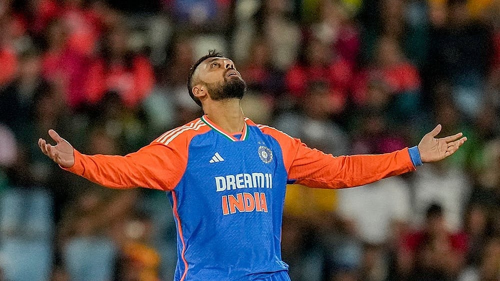 India's Varun Chakravarthy celebrates. - | Photo: AP/Themba Hadebe
