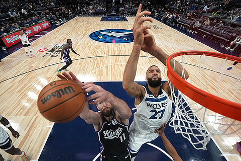 NBA 2024-25: Kings forward Domantas Sabonis (11) and  Timberwolves center Rudy Gobert