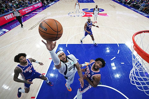 NBA 2024-25: Mavericks' Daniel Gafford goes up for a shot