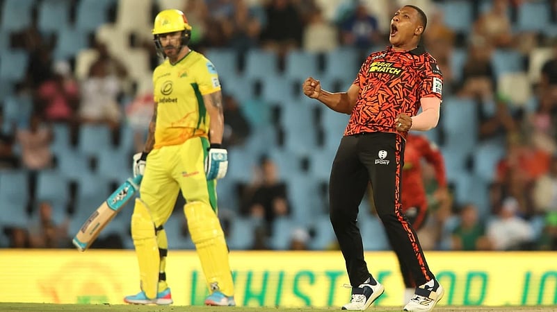 Ottneil Baartman celebrates the wicket of Faf du Plessis during the Eliminator.