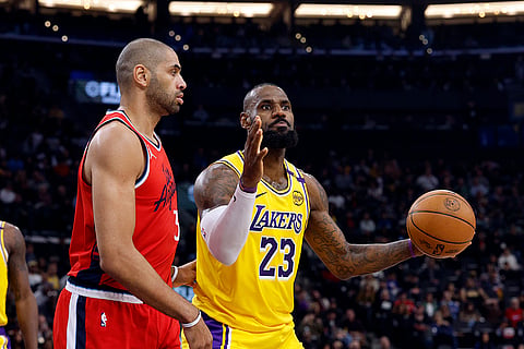 NBA 2024-25: Lakers forward LeBron James reacts after he is called with a foul 