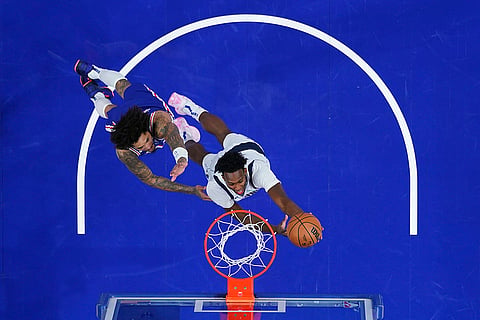 NBA 2024-25: Mavericks' Olivier-Maxence Prosper goes up for a shot