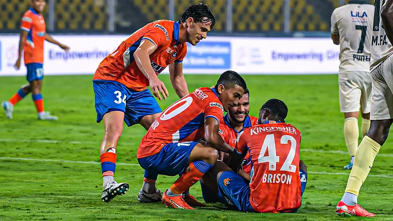FC Goa celebrate a goal against Odisha FC. - Indian Super League