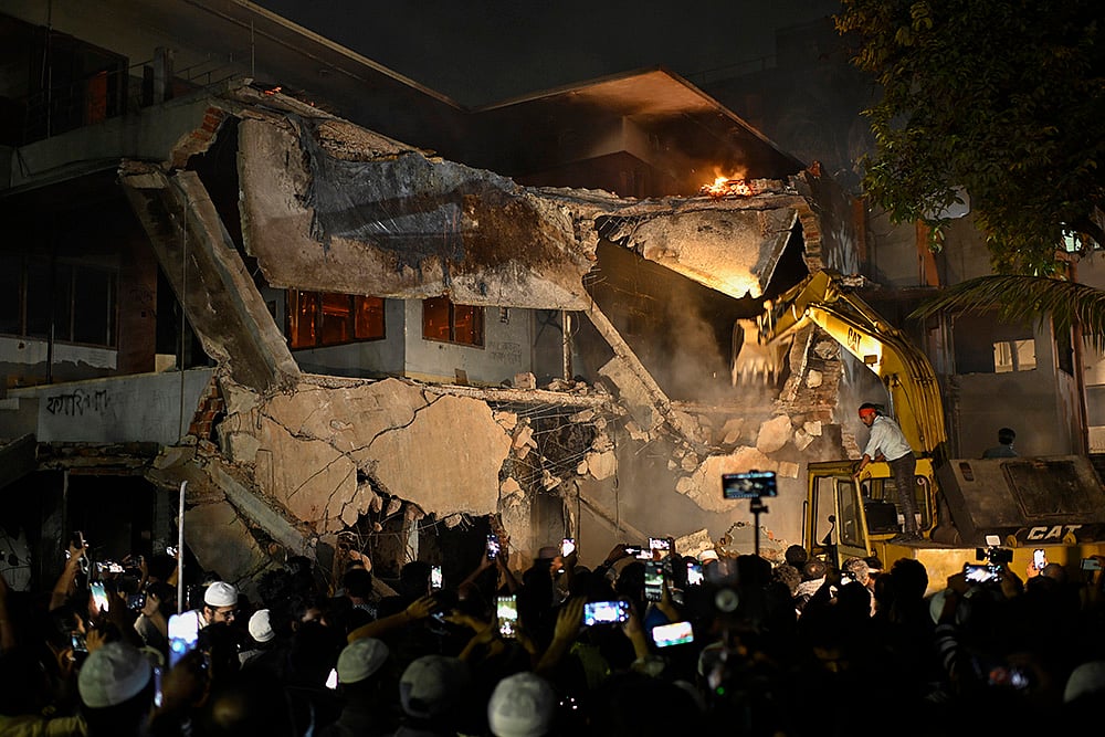 | Photo: AP/Mahmud Hossain Opu : Bangladesh Protest: Sheikh Mujibur Rahman’s Memorial Vandalised