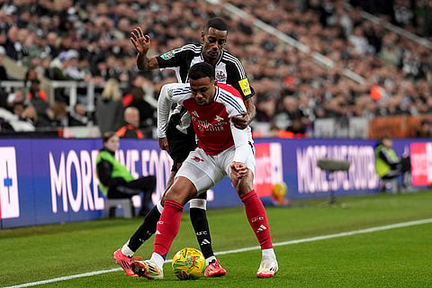 EFL Cup Semi-final: Arsenal's Gabriel and Newcastle's Alexander Isak challenge for the ball