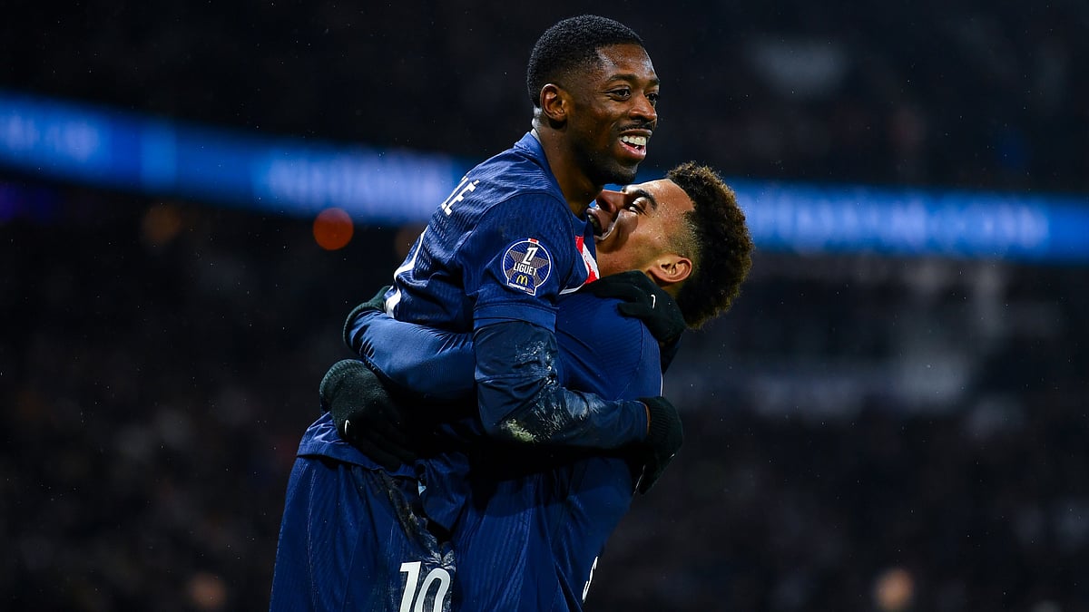 Ousmane Dembele celebrates after scoring his team's third goal versus Monaco