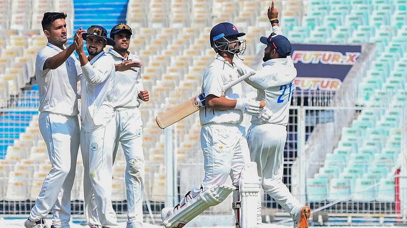 Haryanas Anshul Kamboj celebrates after taking the wicket of Mumbai captain Ajinkya Rahane