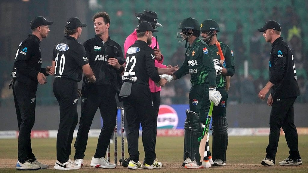 Players shake hands after the first ODI between Pakistan and New Zealand in Lahore.