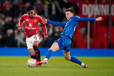 FA Cup: Leicester's Luke Thomas and Man United's Amad Diallo challenge for the ball 