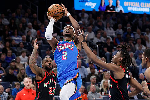 NBA 2024-25: Thunder guard Shai Gilgeous-Alexander (2) looks to shoot 