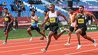 File/PTI : Animesh Kujur (centre) competes in the 100m race during the 38th National Games in Dehradun.