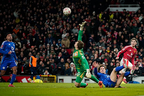FA Cup: Man United's Alejandro Garnacho looks as Leicester's goalkeeper Mads Hermansen challenges 
