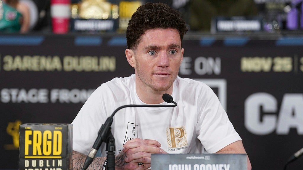 AP/File : Boxer John Cooney listens during a news conference, Nov. 23, 2023, in Dublin.