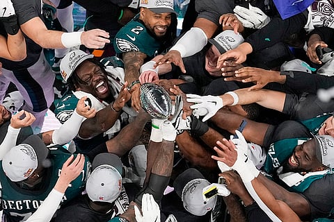 Super Bowl LIX, Eagles vs Chiefs: Eagles players celebrate with the Vince Lombardi Trophy