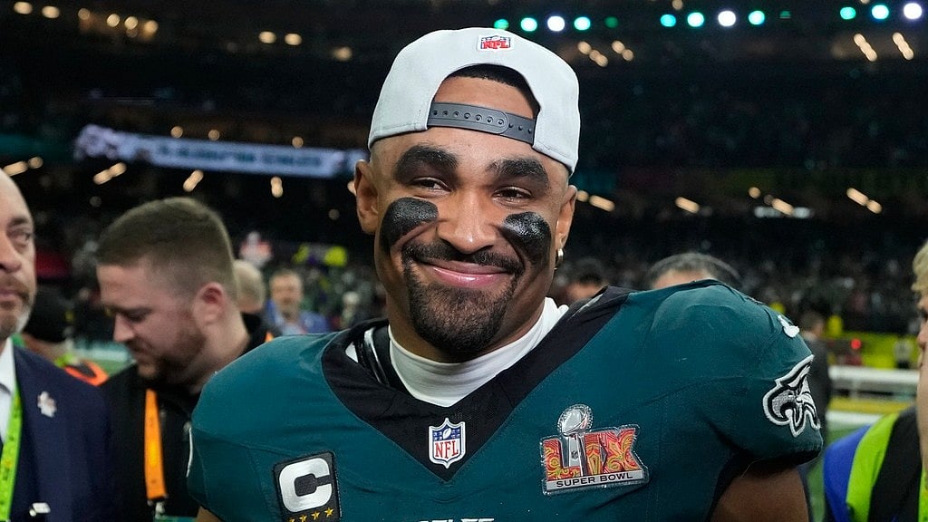 AP/Brynn Anderson : Philadelphia Eagles quarterback Jalen Hurts (1) celebrates after the NFL Super Bowl 59 football game against the Kansas City Chiefs.