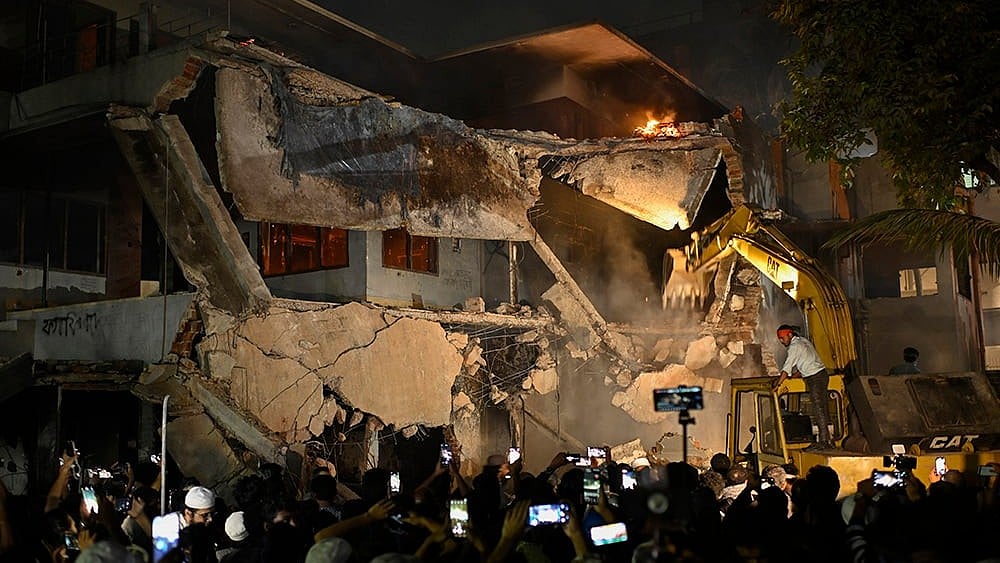 | Photo: AP/Mahmud Hossain Opu : Bangladesh Protest: Sheikh Mujibur Rahman’s Memorial Vandalised