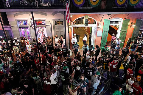 NFL Super Bowl 59 football, Eagles vs Chiefs: Eagles fans celebrate in the French Quarter after the NFL Super Bowl 59