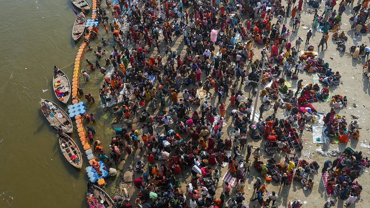 | Photo- PTI : Devotees gather to take holy dip at the Sangam on the eve of 'Mauni Amavasya', during the Maha Kumbh Mela 2025, in Prayagraj, Uttar Pradesh, Tuesday, Jan. 28, 2025. 