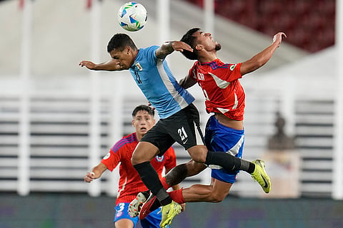 CONMEBOL U20 Championship: Uruguay's Jorge Severo and Chile's Yahir Salazar jump for the ball