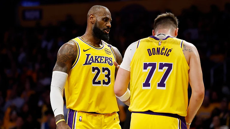 Luka Doncic and LeBron James in action on Monday - null