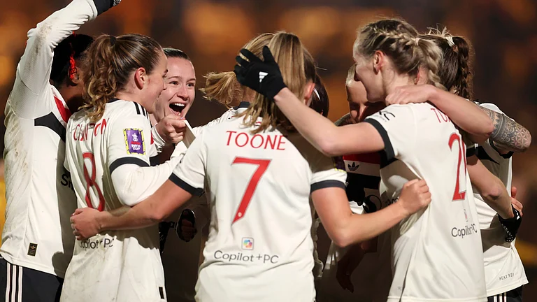 Aoife Mannion of Manchester United celebrates scoring against Wolves - null