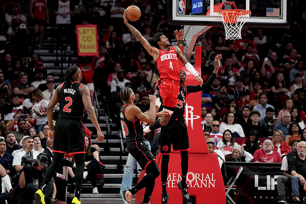 NBA 2024-25: Rockets guard Jalen Green (4) goes up to dunk - | Photo: AP/Eric Christian Smith