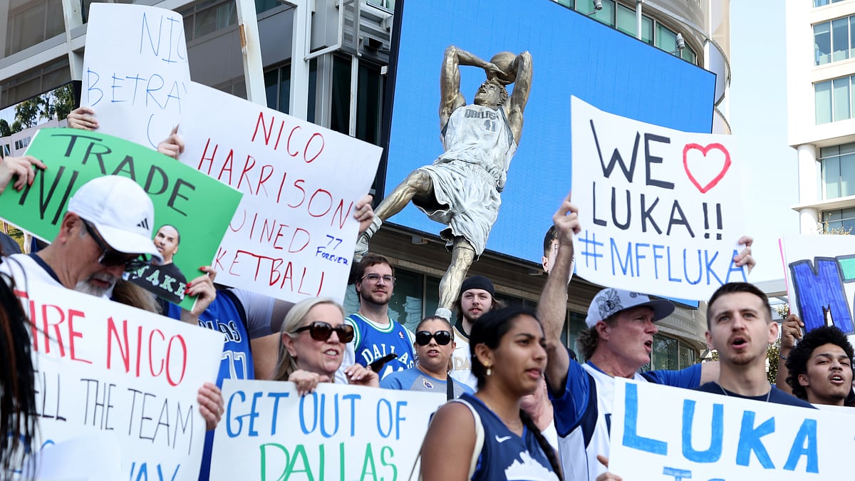 Dallas Mavericks fans protest the Luka Doncic trade