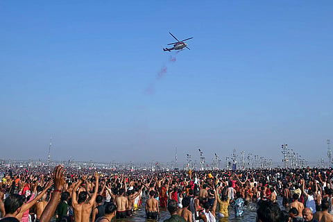Maha Kumbh 2025, Maghi Purnima Snan: A helicopter showers flower petals on devotees
