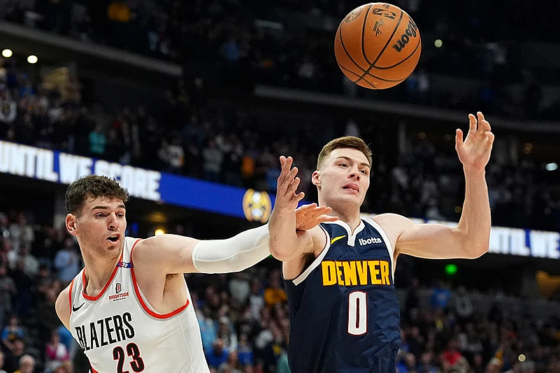 NBA basketball game 2024-25 Denver Nuggets vs Portland Trail Blazers: Christian Braun