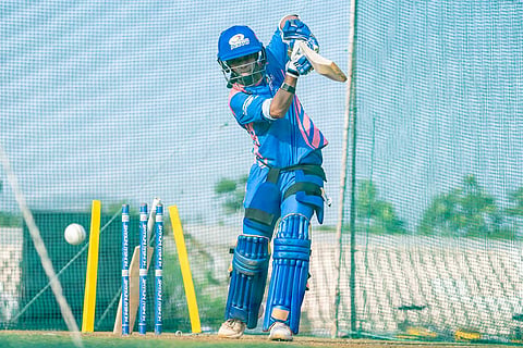 Amanjot Kaur tackles the ball in the nets
