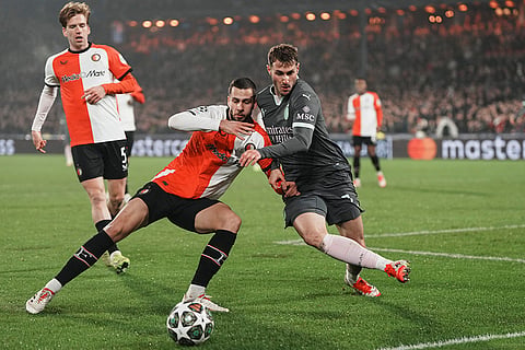 Champions League playoff first leg: AC Milan's Santiago Gimenez challenges for the ball with Feyenoord's David Hancko