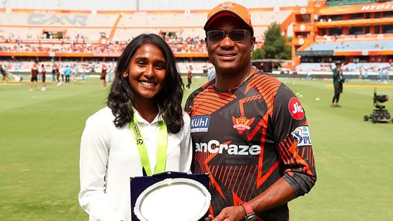 Gongadi Trisha with the legendary Brian Lara. - Special Arrangement
