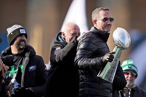 Super Bowl Eagles Parade: Eagles general manager Howie Roseman holds up the Lombardi trophy