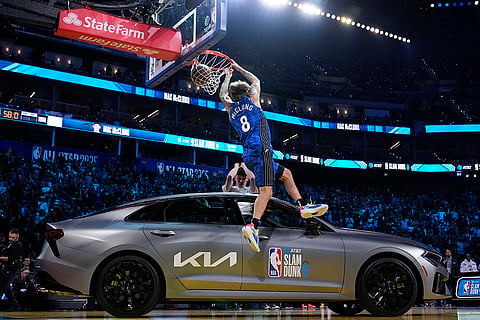 Slam Dunk Contest: Osceola Magic guard Mac McClung dunks over a car