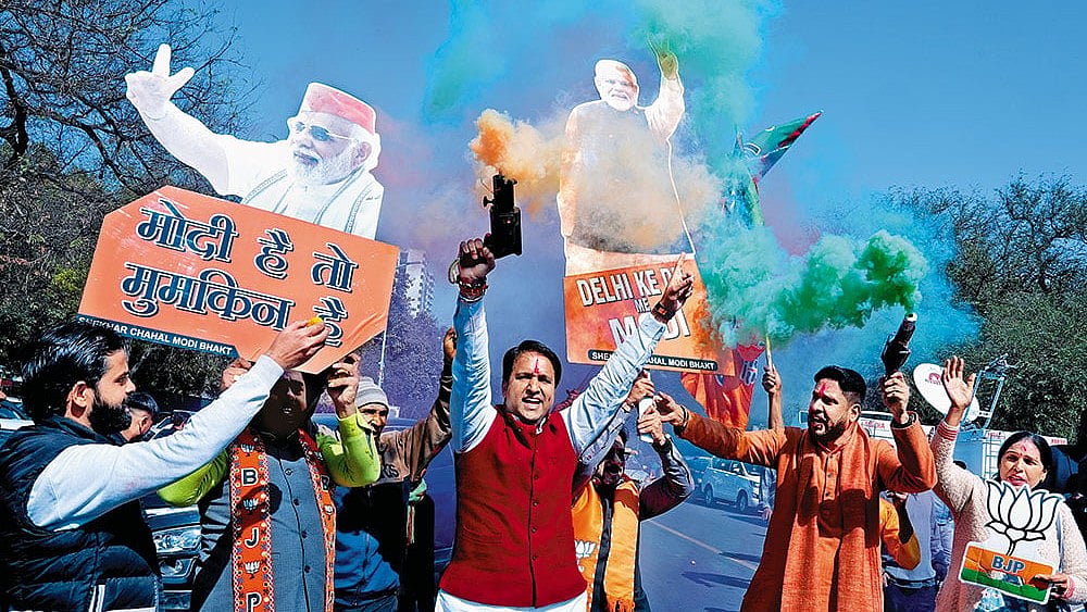 | Photo: Tribhuvan Tiwari : Back After 27 Years: Supporters of the BJP celebrating outside the  party office in Delhi