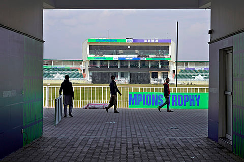 Champions Trophy 2025: Workers give final touches to an enclosure in Rawalpindi Cricket Stadium