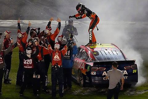 NASCAR Daytona 500: William Byron, on car, celebrates with his pit crew 