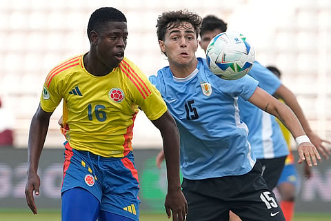South American U-20 Championship: Colombia's Yefrei Rodriguez and Uruguay's Alfonso Montero eye the ball