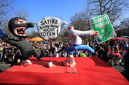 In Germany, a Charlie Hebdo themed float with the inscription 'Satire cannot get killed'  - stock photo