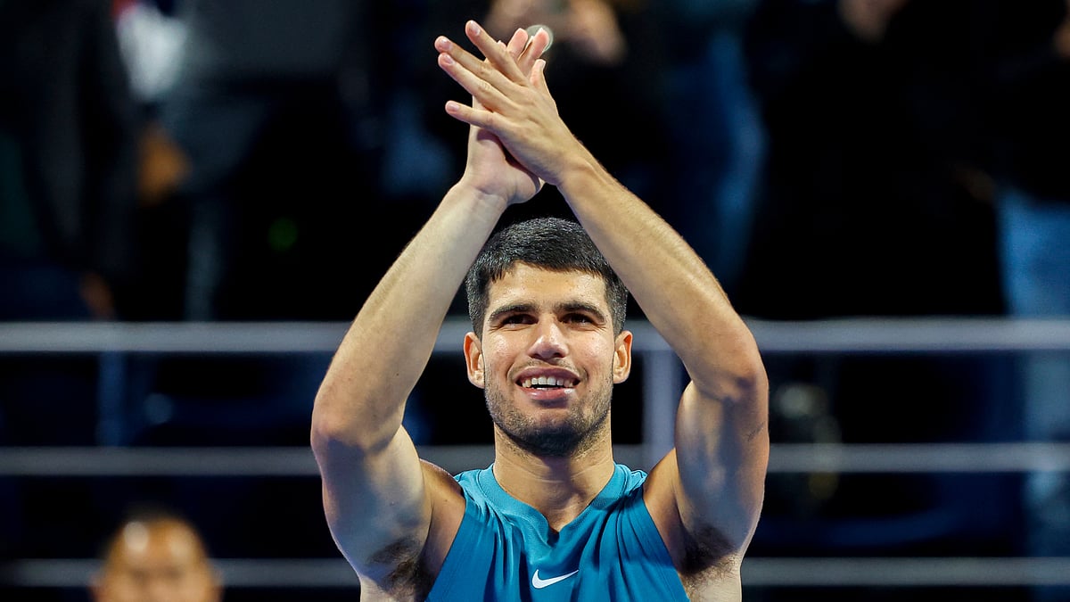 Carlos Alcaraz celebrates his win over Luca Nardi at the Qatar Open