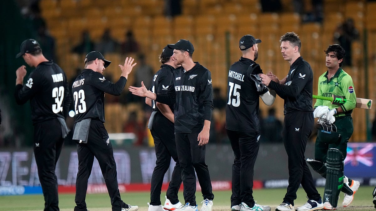 New Zealand's Mitchel Santner, center, and teammates congratulate each others after winning the ICC Champions Trophy cricket match against Pakistan, in Karachi. - AP Photo/Anjum Naveed