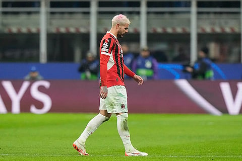 Champions League Soccer playoff second leg: AC Milan's Theo Hernandez leaves the pitch after being sent off 