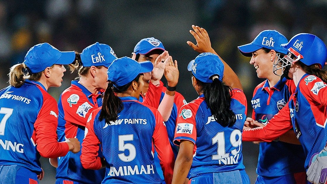 X/@DelhiCapitals : DC players celebrating their win against UPW.