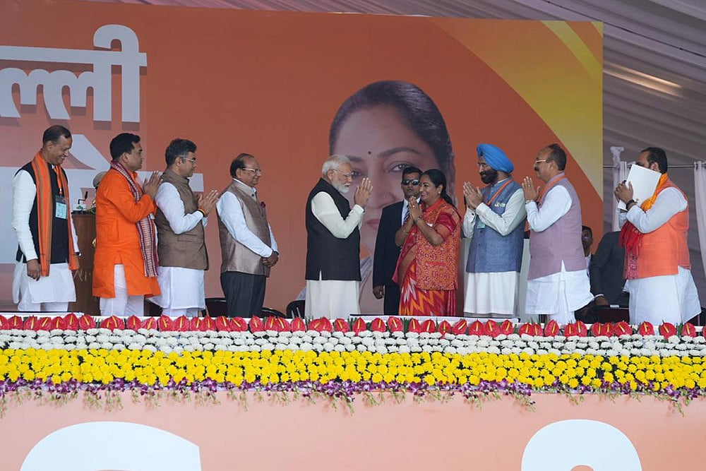 Delhi government swearing-in ceremony_PM Narendra Modi with Rekha Gupta and Ministers