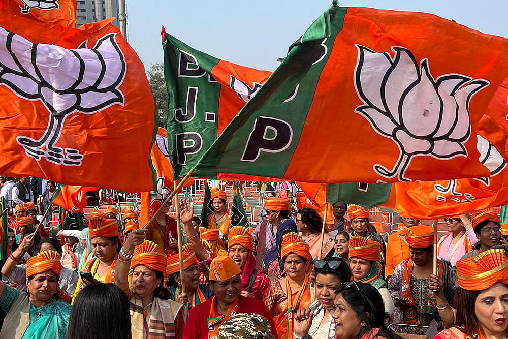 Delhi government swearing-in ceremony_ BJP supporters at Ramlila Maidan