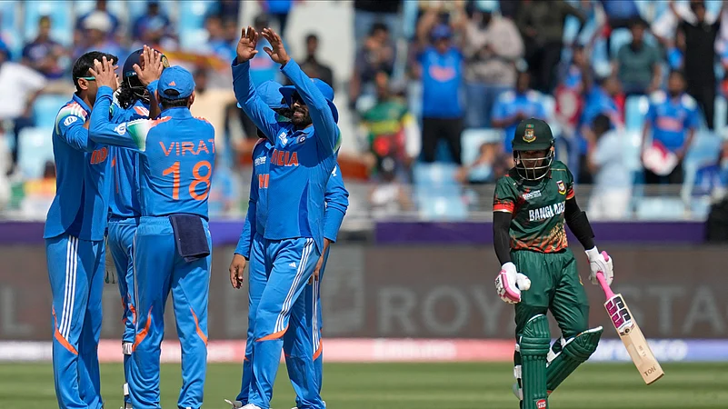 Indian players celebrate the dismissal of Bangladeshs Rahim. AP