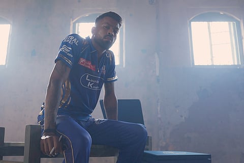 Mumbai Indians captain Hardik Pandya with the new jersey of the team ahead of the Indian Premier League 2025 season.