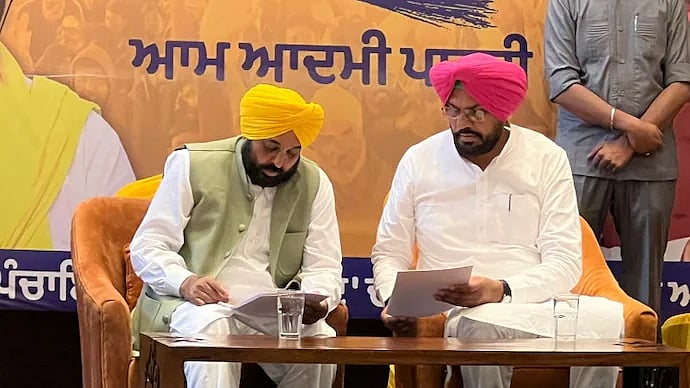 Punjab CM Bhagwant Mann with minister Kuldeep Singh Dhaliwal 