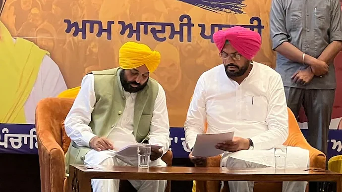 Punjab CM Bhagwant Mann with minister Kuldeep Singh Dhaliwal