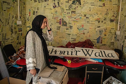 'The Kashmir Wala' reporter Asma Bhat reacts while vacating their office in Srinagar |